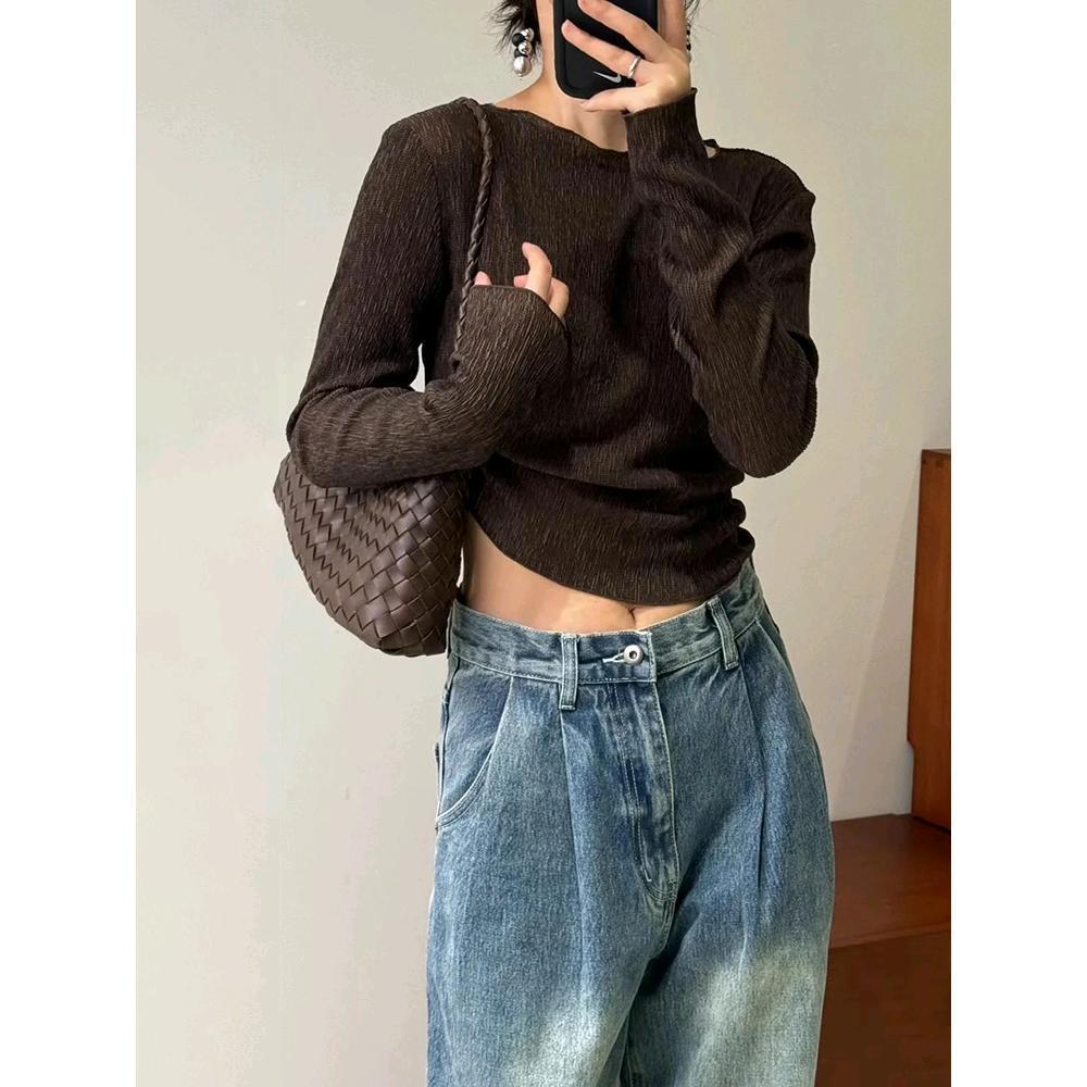 Sac à main pour femme en cuir véritable avec design ergonomique.