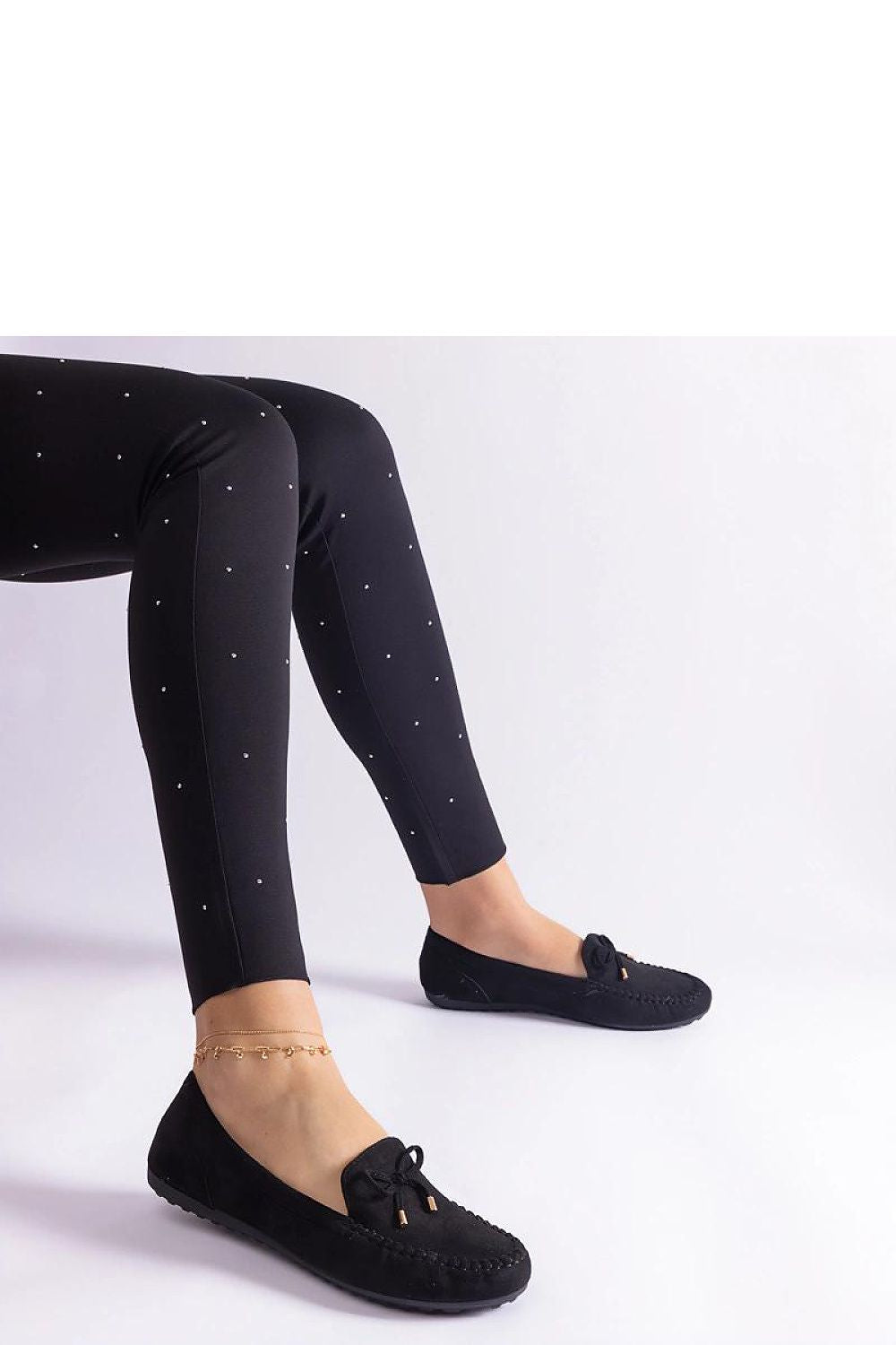 Mocassins slip-on modernes et confortables avec une finition raffinée, parfaits pour un usage quotidien ou des occasions spéciales.