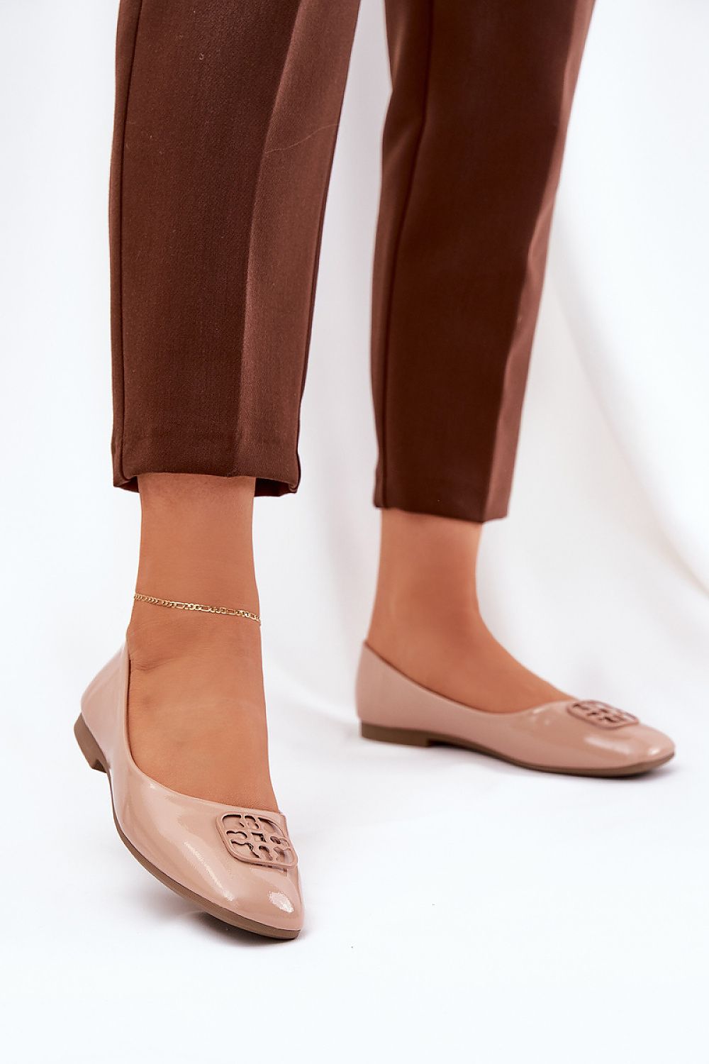 Ballerines ComfortGlow en simili cuir avec semelle intérieure en cuir naturel.