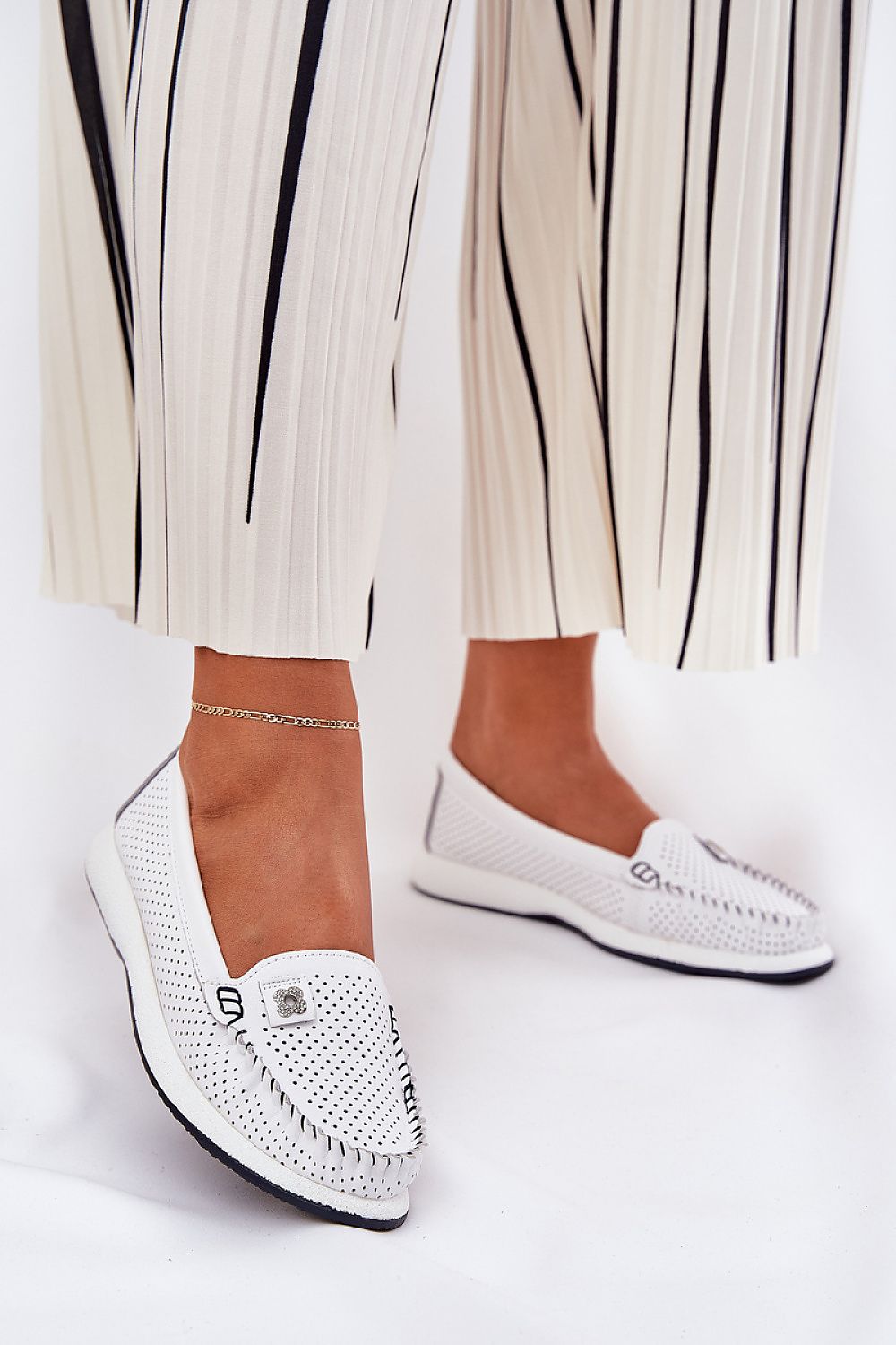 Mocassins StepEase Comfort pour femmes offrant élégance et confort avec une semelle intérieure respirante et un design polyvalent.