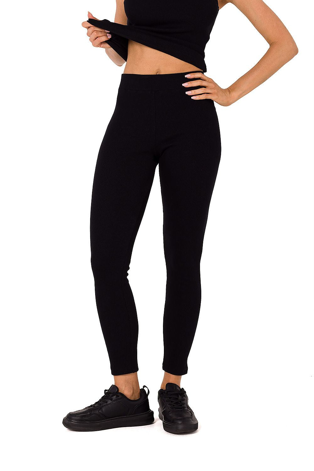 Legging MoeFlex taille haute avec coutures élégantes, parfait pour tous les usages.