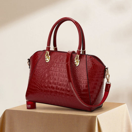 Sac femme polyvalent en forme de coquille avec design élégant.