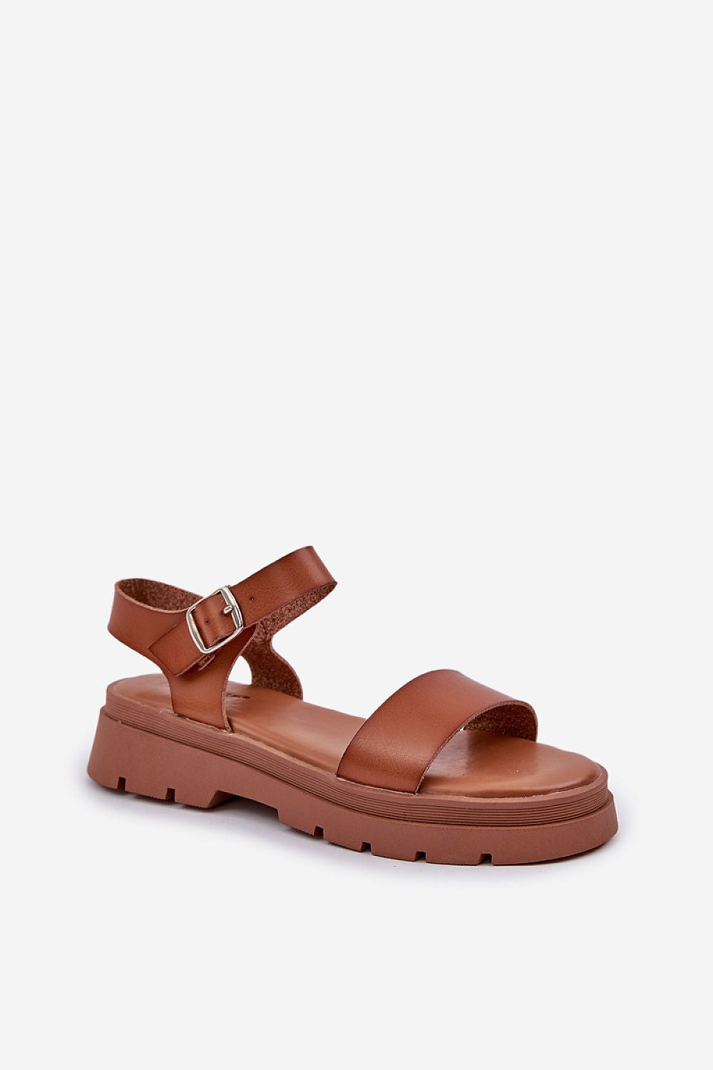 Sandales confortables en cuir écologique avec talon plat et plateforme.