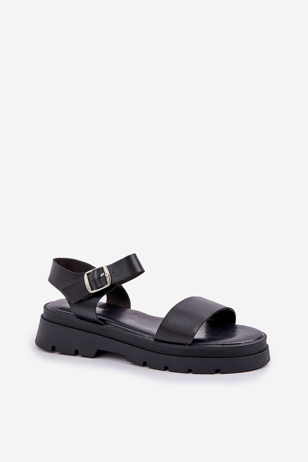 Sandales confortables en cuir écologique avec talon plat et plateforme.